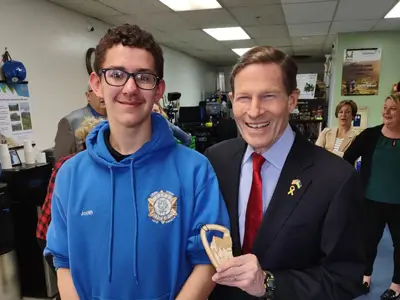 Senator Richard Blumenthal came to visit for youth promise career pathways and took selfies with the youth at Project Imo Base Camp